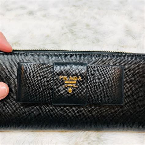 prada bow wallet|authentic prada wallet sale.